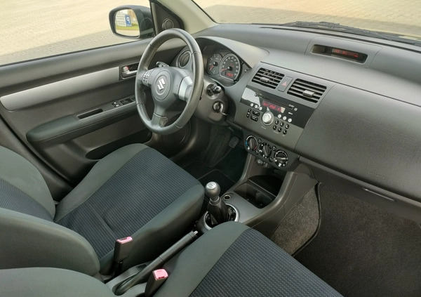 Suzuki Swift cena 13900 przebieg: 170675, rok produkcji 2009 z Zambrów małe 407